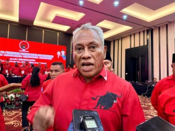 1-KOMARUDIN WATUBUN
